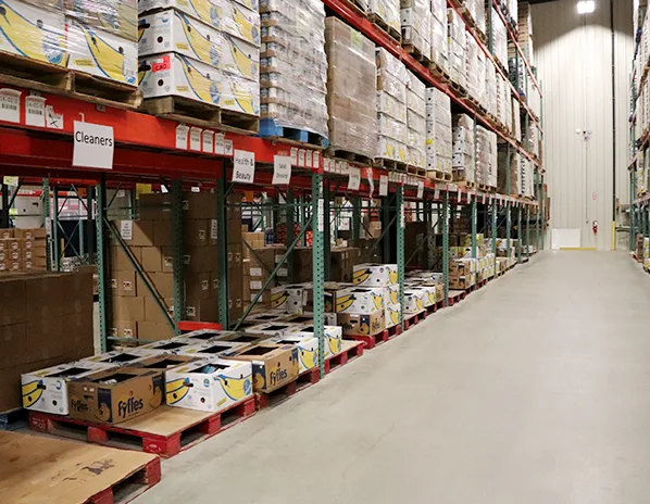 Warehouse racking full of boxes of food at the Auburn warehouse.