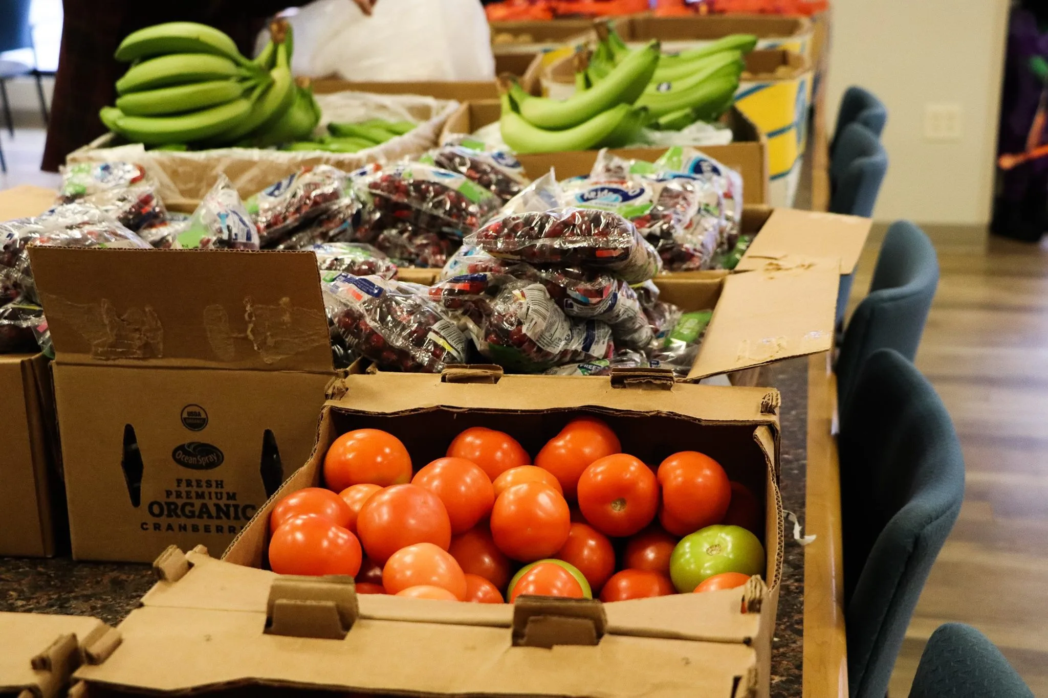 Boxes of fresh produce open at a GSFB partner facility.