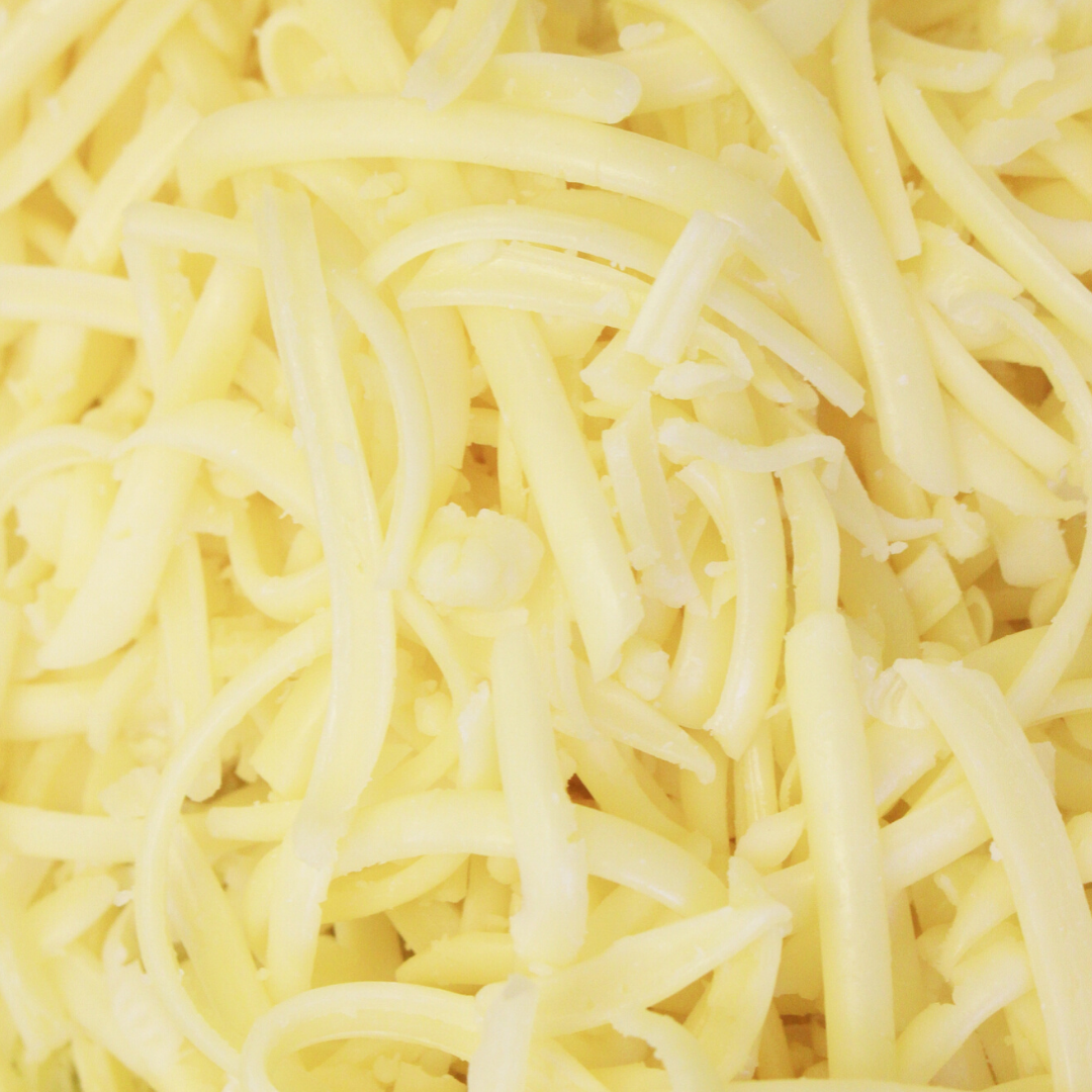 A close-up of shredded cheese.