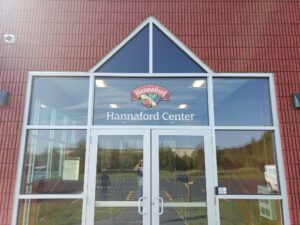 Front entrance and windows at the Hannaford Center in Hampden, ME.