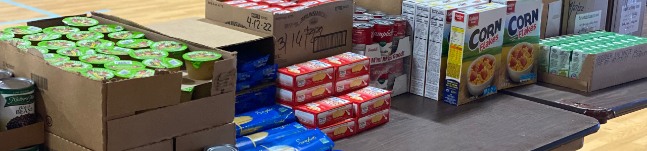 Boxes and cans of food at St. Ann's Food Pantry