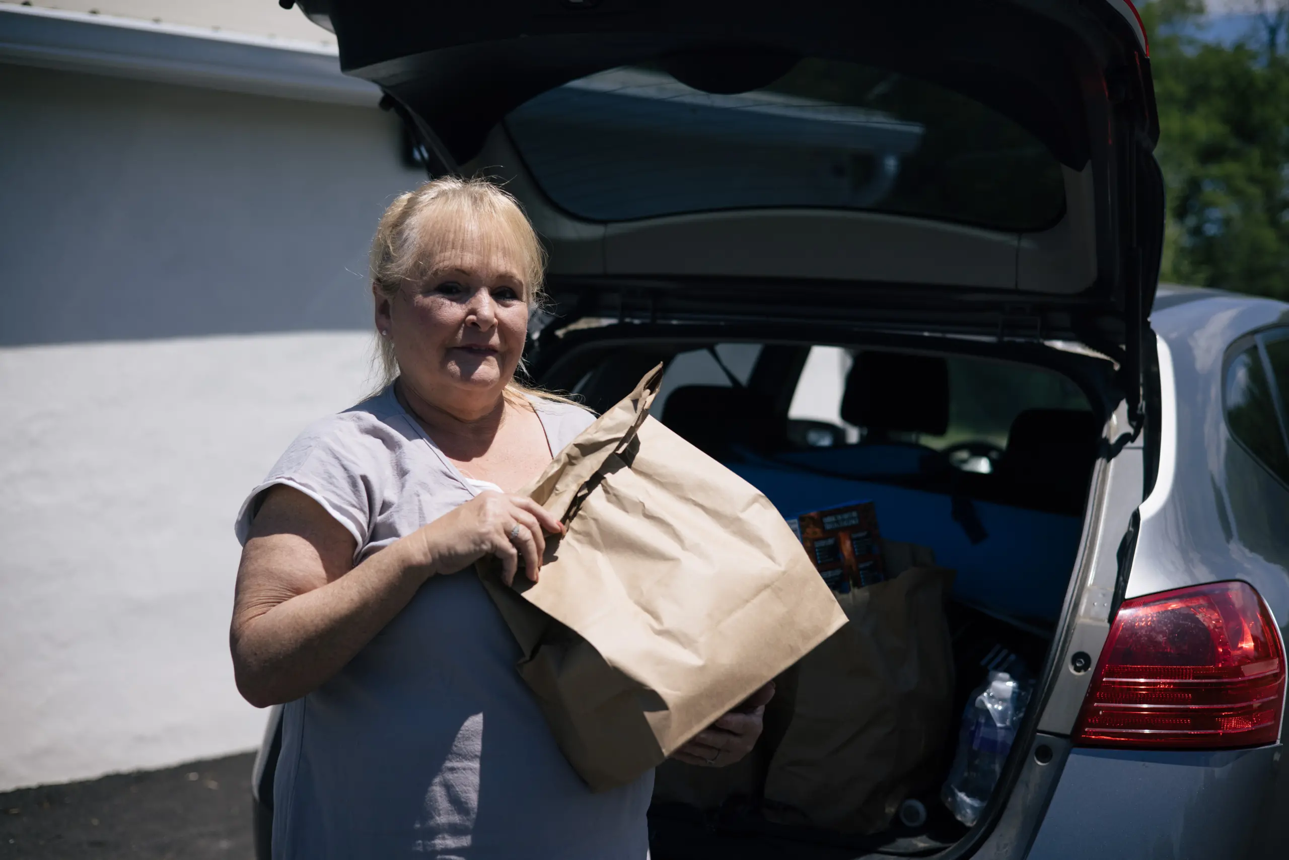 Woman with bag of food