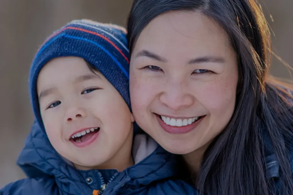 A mom and her son enjoying the winter air