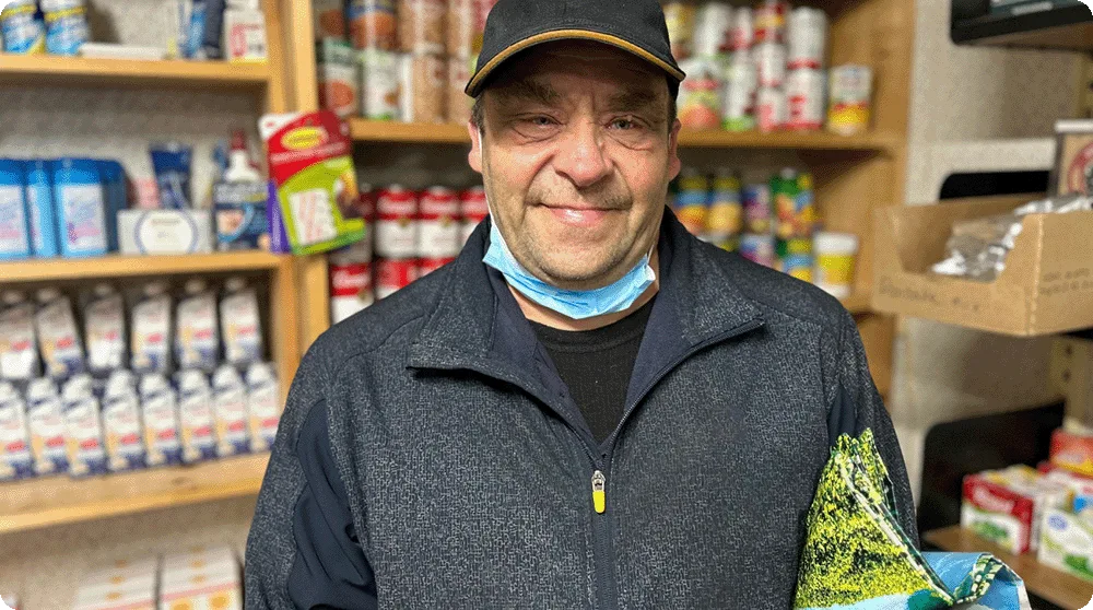 David, an older Mainer, is visiting the Irene Chadbourne Ecumenical Food Pantry, a partner of Good Shepherd Food Bank.